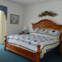 The Master Bedroom with it's Queen size bed features its own ensuite Bathroom as well as direct access to the Pool deck