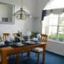 The main dining room allows up to 6 people to dine comfortably.