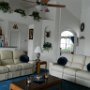 The main living room area features 2 comfortable sofa's and a widescreen cable television. It also has direct access to the pool deck.